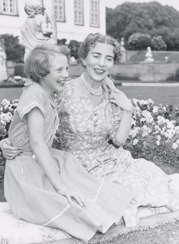With her mother Queen Ingrid of Denmark at the family's summer residence in 1954. Margrethe is 13.