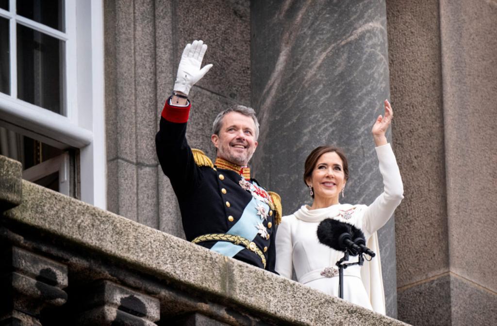 Denmark's newly proclaimed King Frederik and Queen Mary wave on the balcony of Christiansborg Palace, following the abdication of former Queen Margrethe ll.