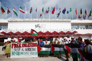 النجوم وعلم فلسطين في مهرجان فينيسيا